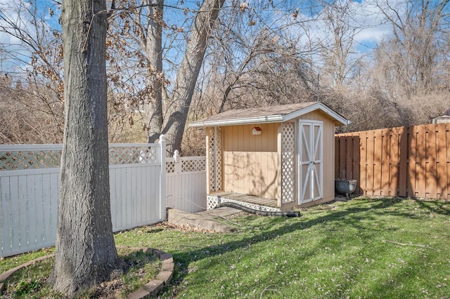 view of shed featuring a fenced backyard