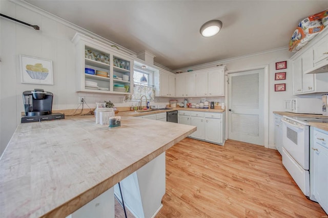 kitchen featuring light wood-type flooring, white appliances, white cabinets, and light countertops