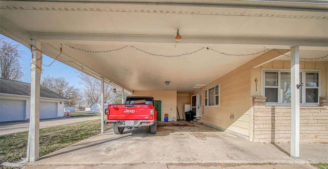 view of patio / terrace with an attached carport