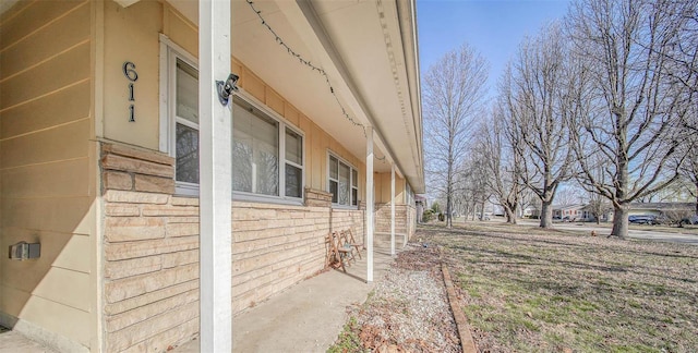 view of property exterior with brick siding