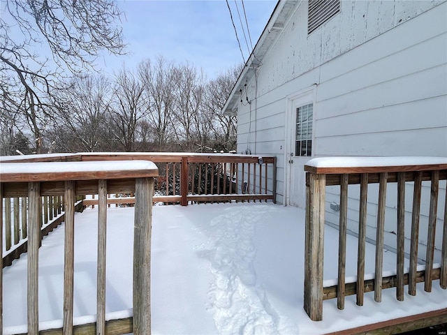 view of snow covered deck