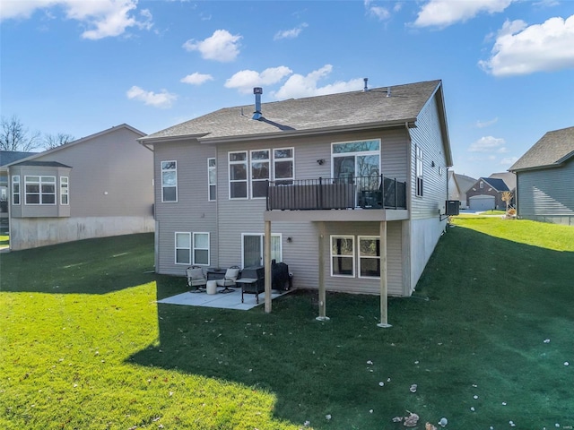 rear view of house with cooling unit, a patio, and a lawn