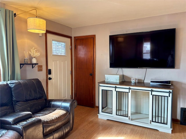 living area with wood finished floors