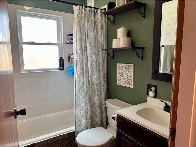 bathroom with shower / bath combo, vanity, and toilet