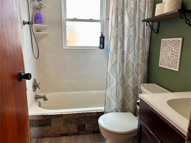 full bathroom with shower / bath combo, vanity, and toilet