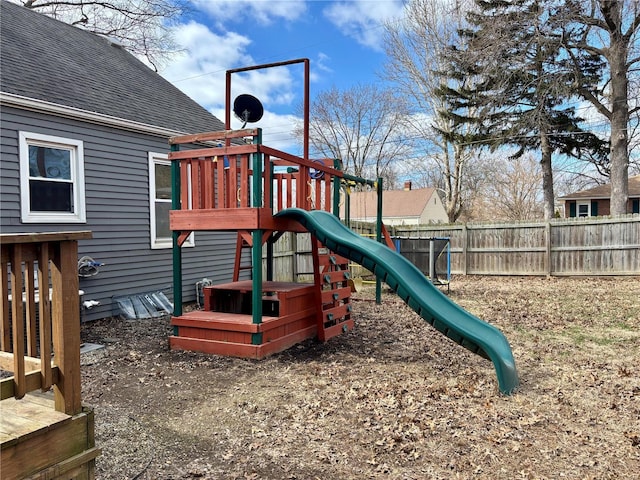 view of jungle gym with fence