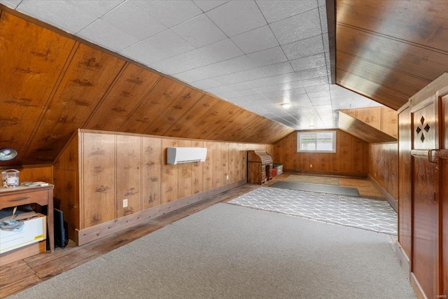 bonus room with baseboards, wooden ceiling, vaulted ceiling, carpet flooring, and wood walls