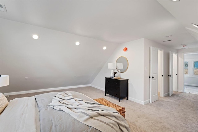 bedroom featuring baseboards, visible vents, recessed lighting, vaulted ceiling, and light colored carpet