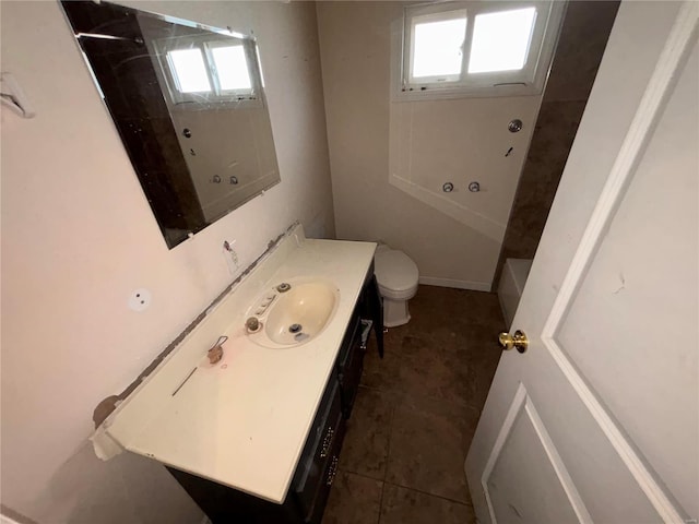 full bathroom with toilet, walk in shower, vanity, and tile patterned floors