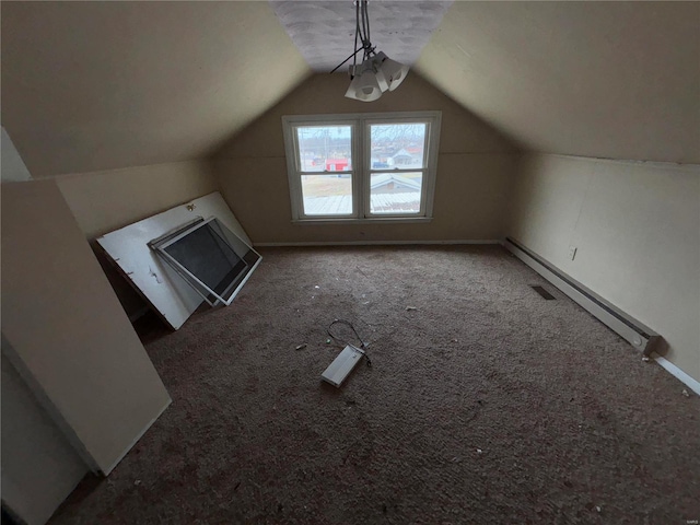 bonus room with lofted ceiling, baseboard heating, and carpet flooring