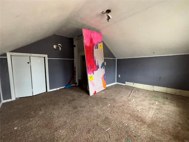 bonus room featuring lofted ceiling