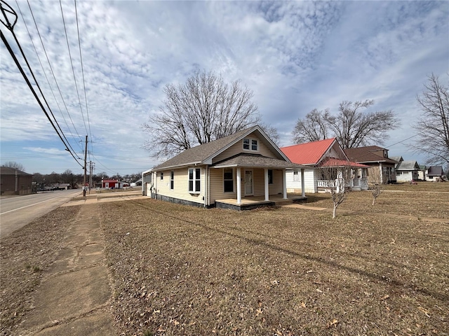 view of front of home featuring covered porch