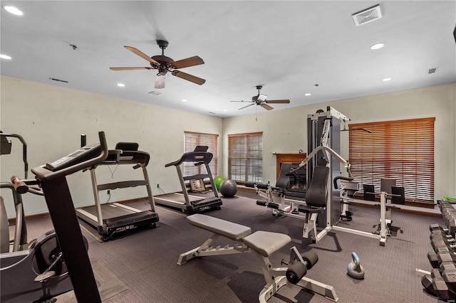 exercise area featuring a ceiling fan, visible vents, and recessed lighting