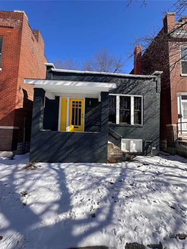 view of front of property with brick siding