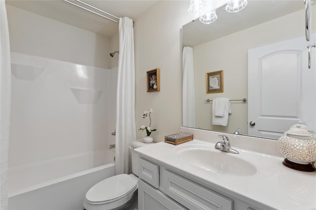 bathroom with toilet, vanity, and shower / bathtub combination with curtain