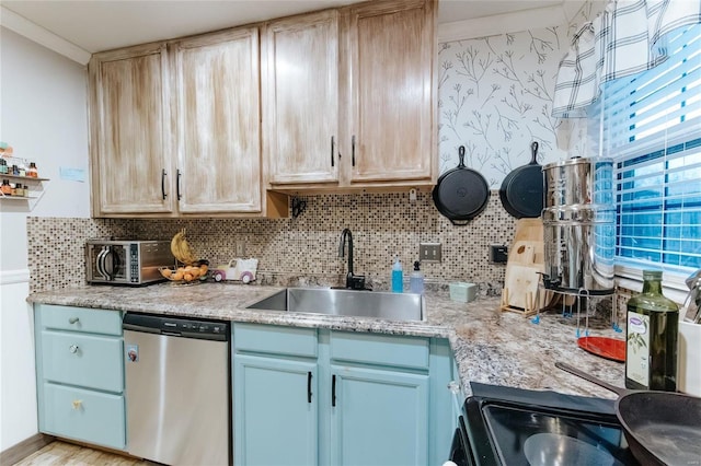 kitchen featuring a toaster, dishwasher, backsplash, light countertops, and a sink