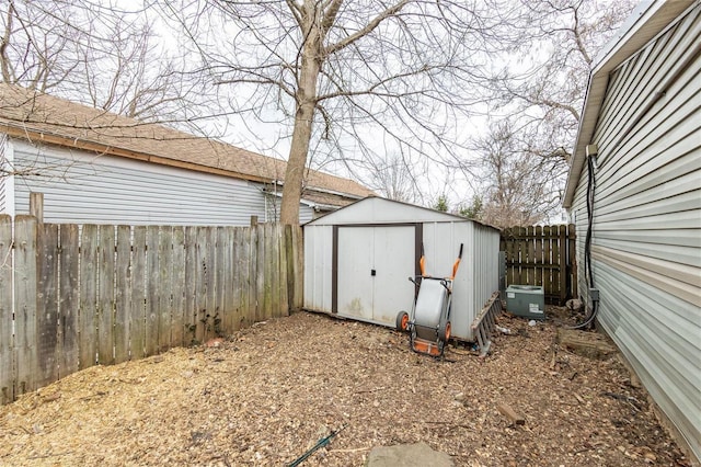 view of shed featuring a fenced backyard