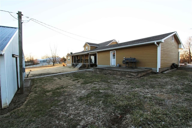 exterior space featuring a yard and a patio