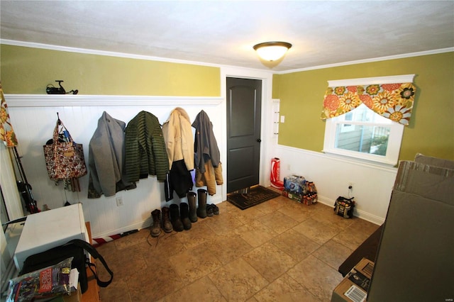 mudroom with baseboards and ornamental molding