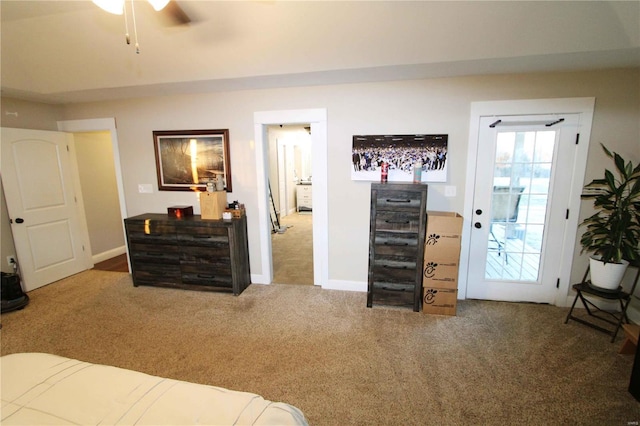 carpeted bedroom featuring baseboards