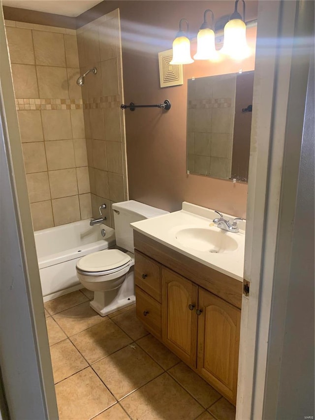 bathroom with visible vents, toilet, shower / washtub combination, and tile patterned flooring