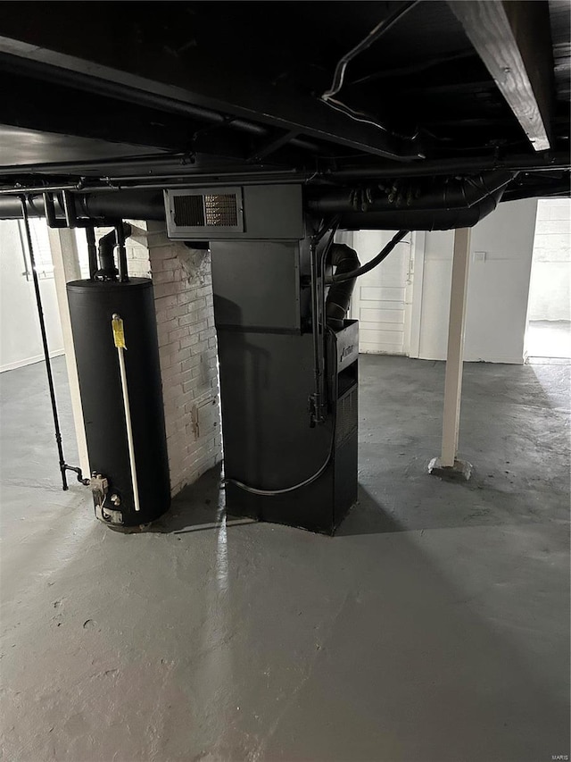 unfinished basement featuring heating unit, water heater, and visible vents