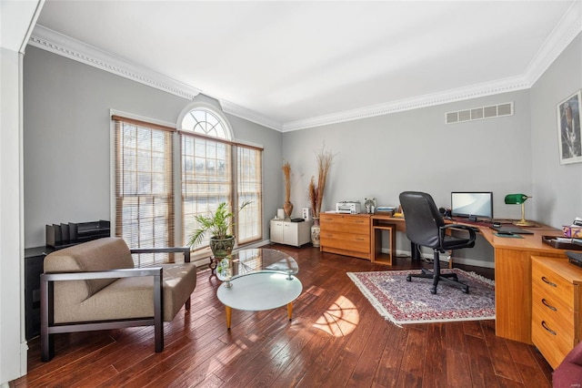 office space featuring dark wood-style flooring, visible vents, crown molding, and baseboards