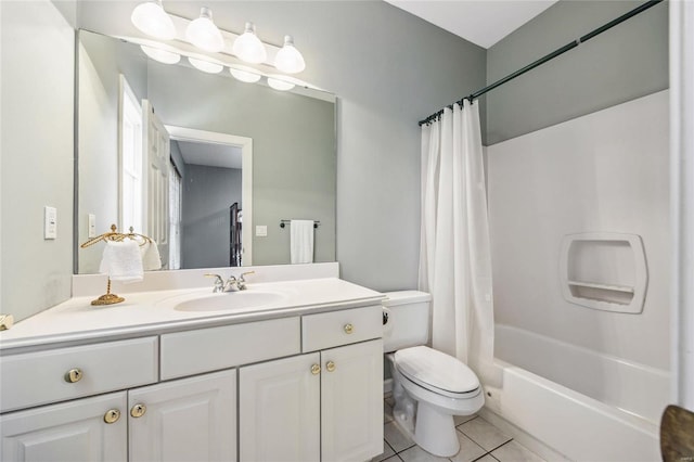 full bathroom featuring toilet, tile patterned flooring, shower / bath combo, and vanity