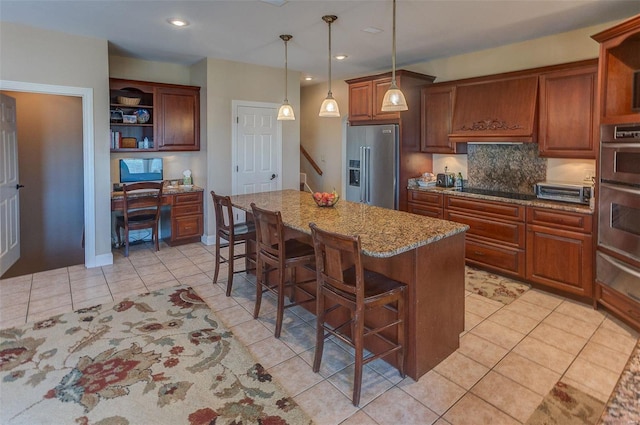 kitchen featuring open shelves, a kitchen breakfast bar, a center island, appliances with stainless steel finishes, and stone counters