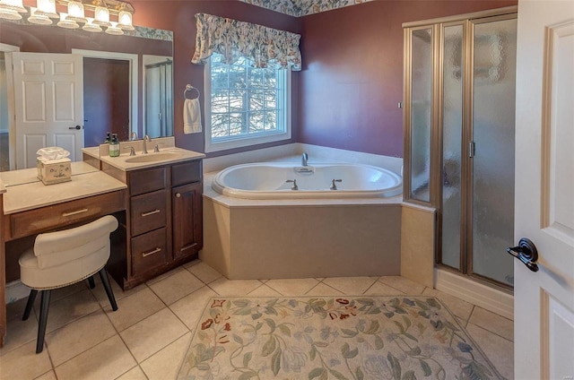 full bath with vanity, tile patterned floors, a bath, and a shower stall