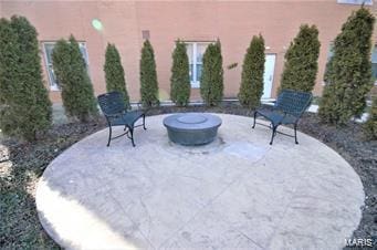 view of patio / terrace with a fire pit