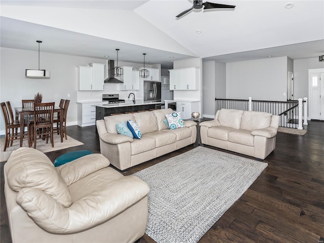 living room with dark wood-type flooring, ceiling fan, baseboards, vaulted ceiling, and recessed lighting