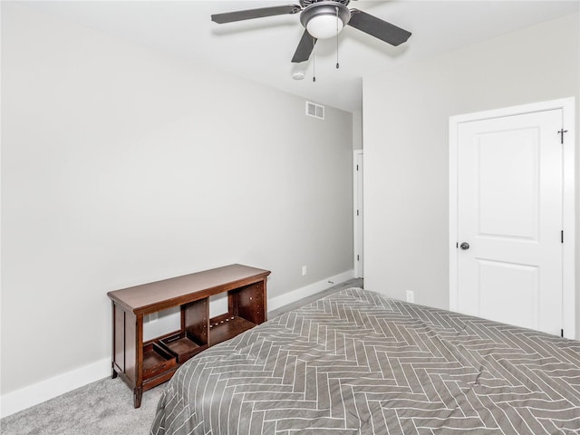 bedroom with visible vents, baseboards, carpet, and a ceiling fan