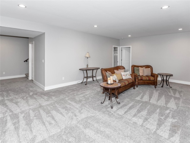 sitting room with recessed lighting, baseboards, and carpet floors