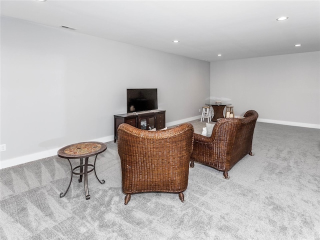 sitting room with recessed lighting, carpet, visible vents, and baseboards