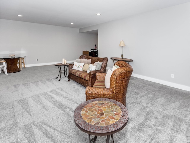 living area with recessed lighting, baseboards, and carpet floors