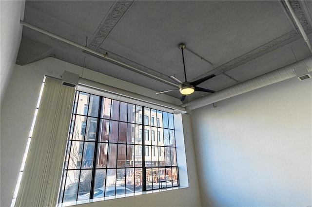 interior details featuring a ceiling fan