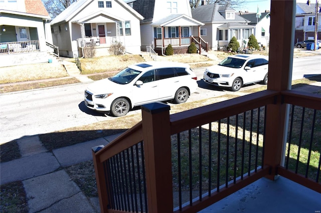 exterior space featuring a residential view and covered porch