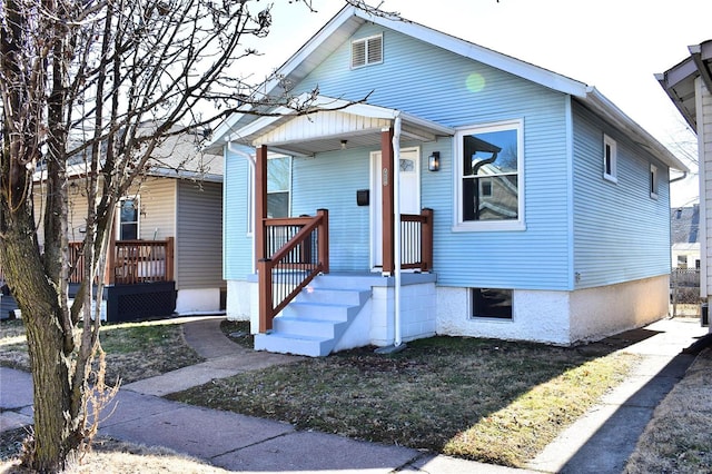 bungalow-style home featuring a porch