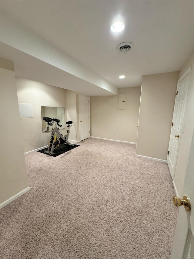 exercise area featuring recessed lighting, carpet, visible vents, and baseboards