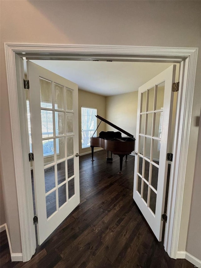 interior space featuring dark wood-style floors and french doors