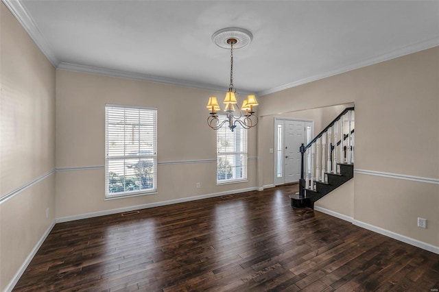 interior space with baseboards, wood finished floors, stairs, crown molding, and a notable chandelier