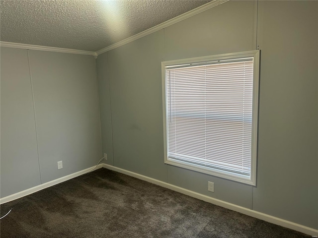 unfurnished room featuring ornamental molding, dark carpet, and a textured ceiling