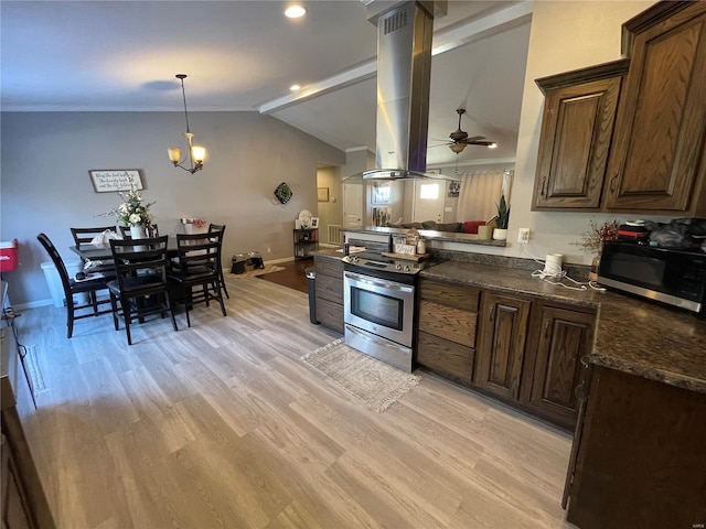 kitchen with lofted ceiling, electric range, light wood-style floors, island range hood, and baseboards