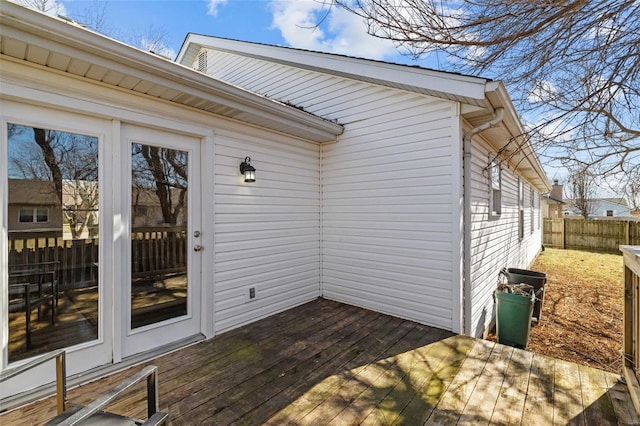 wooden deck featuring fence