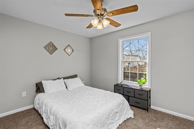 bedroom featuring carpet, baseboards, and ceiling fan