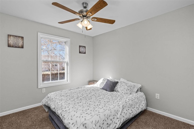 bedroom with carpet, a ceiling fan, and baseboards