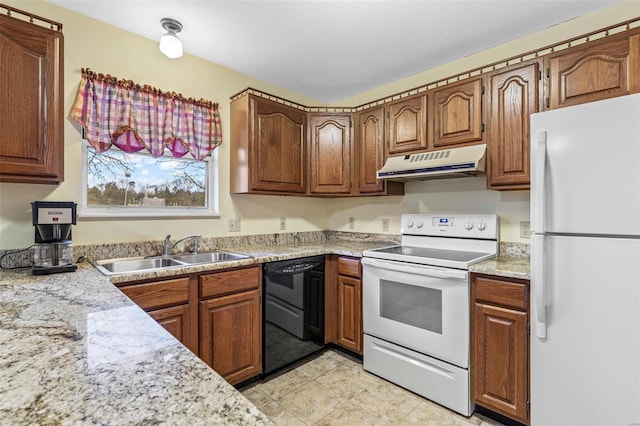 kitchen featuring white appliances, range hood, brown cabinets, and a sink