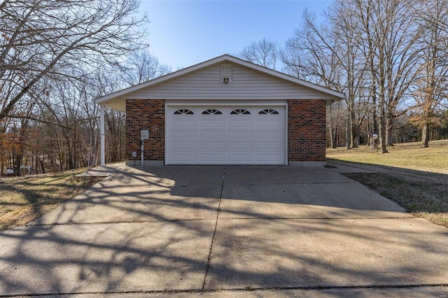 garage featuring driveway