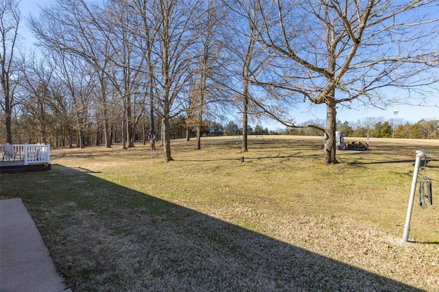 view of yard featuring a wooden deck